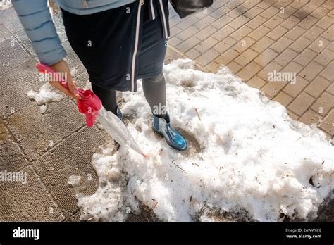 Woman Walking Thru The Thaw Making Steps Stock Photo Alamy