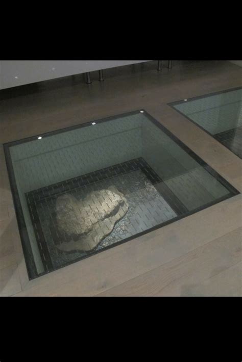 How To Use Glass Floor Panels To Connect Spaces In A Custom Home