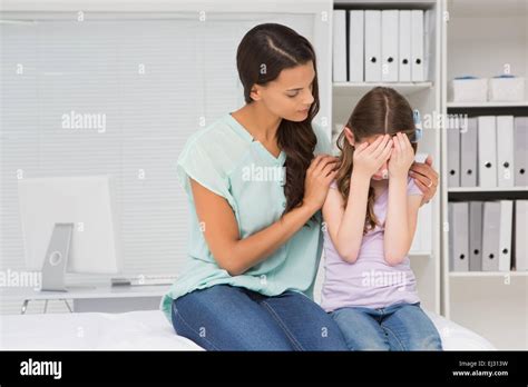 Little Girl Crying With Her Mother Stock Photo Alamy