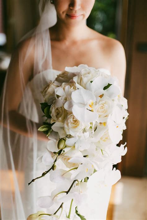 Elegant All White Orchid Bridal Bouquet Perfect For A Beach Wedding Steve And Sei Hong
