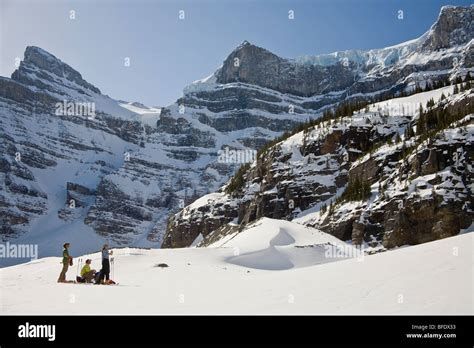 Skiers Enjoying The View At White Pyramid Mt Chephren Icefields