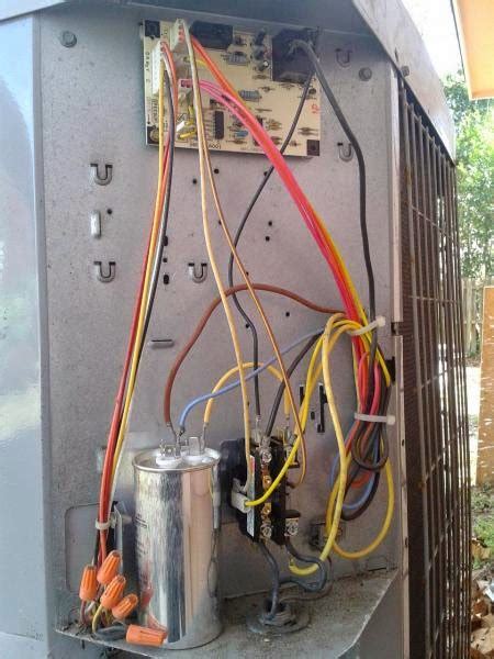 We are trying to install a goodman heat pump with a rheem air handler, the orange wire is hook up and the unit is still staying in the heat mood. Electric Work: AC System
