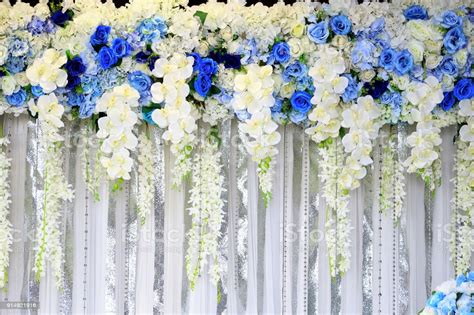 White And Blue Color Of Artificial Flowers As Backdrops Wedding