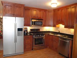 Before & after pictures of kitchen remodel. Red oak kitchen cabinet photos