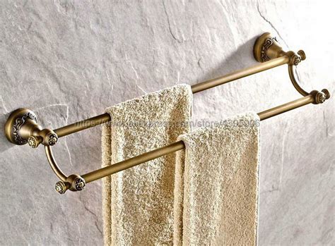 That's mighty helpful, that's mitre10. Antique Brass Double Towel Holder Towel Rail Wall Mounted ...