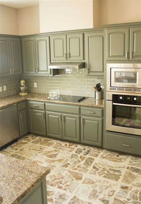It denotes earth friendly as well as calm. Gorgeous sage green cabinets and light brown granite ...