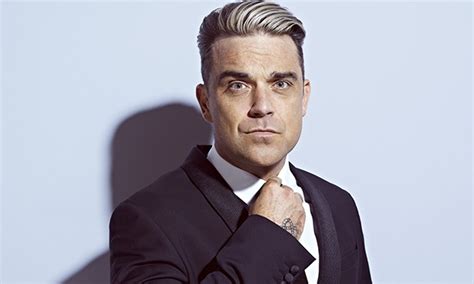 Robbie Williams Unveils Surprise New Album Music The Guardian