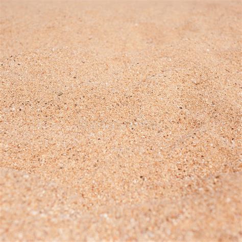 Beach Sand As Background Yellow And Brown Grain Sandy Texture Stock
