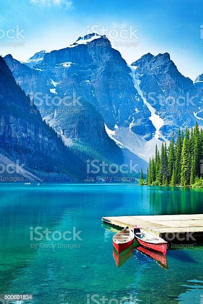 Lake Moraine And Canoe Dock In Banff National Park Stock Photo
