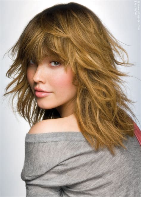 2023 Popular Shoulder Length Feathered Hairstyles With Bangs