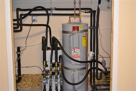 Non Pressurized Flow Center And Electric Water Heater Being Used For