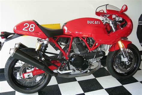 The bike is sold with 12 months mot. For sale: Ducati Sport 1000 S - only 148 Miles ...