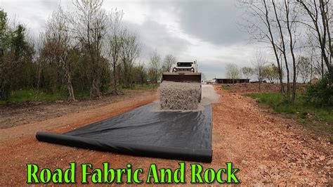 Installing Geotextile Fabric And Rock On The Track Youtube