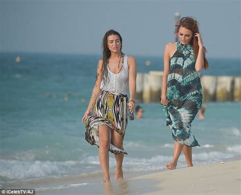 Wayne Rooney Prostitute Jenny Thompson In Covered Up Stroll On Dubai Beach Daily Mail Online