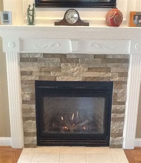 Our fireplace actually did not fit either of these categories. fireplace makeover wirh faux stone | Home Improvement ...