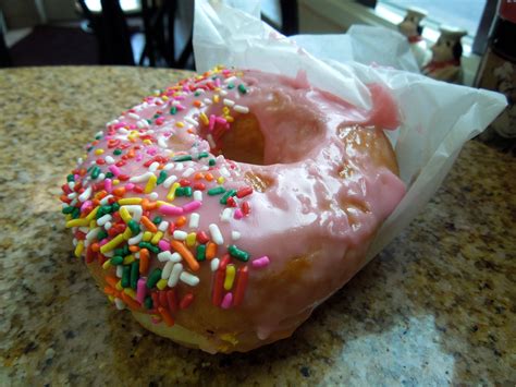 Strawberry Frosted Donut With Sprinkles Dishing On Donuts The Other