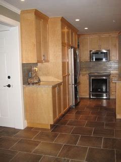 What color countertops go with dark maple cabinets? What counters/flooring/backsplash go with light maple cabinets?