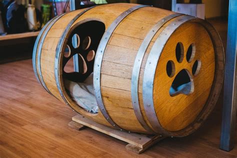 Repurposed Wine Barrel Dog House With Paw Windows