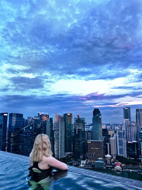 Our game rules do not allow any person under the age of 18 to place a bet or claim a winning ticket prize. Sunrise Swimming In The Infinity Pool at The Marina Bay Sands Hotel