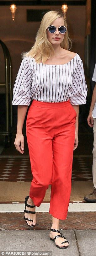 Margot Robbie Continues Nyc Suicide Squad Promo In Striped Blouse And Orange Trousers Daily