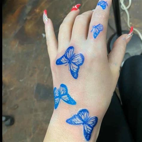 Justkaylaaaa Butterfly Hand Tattoo Butterfly Tattoos On Arm Blue