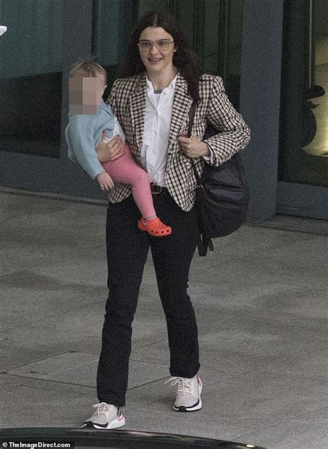 Rachel Weisz Flaunts Her Chic Off Duty Style As Carries Her Daughter
