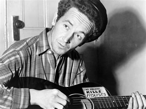 Woody Guthrie, Influential Songwriter and Folk Singer