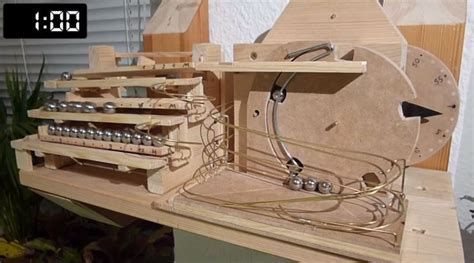Mechanical Clock Relies On Marbles To Tick Marble Clock Mechanical