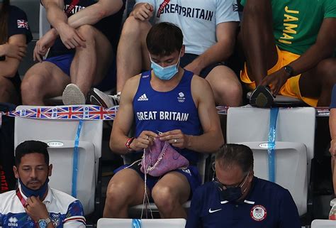 olympic champion tom daley melts hearts as he knits from the stands 🧶