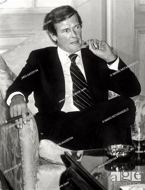 Roger Moore The British Actor Roger Moore Photographed In Rome For An Interview While Smoking A
