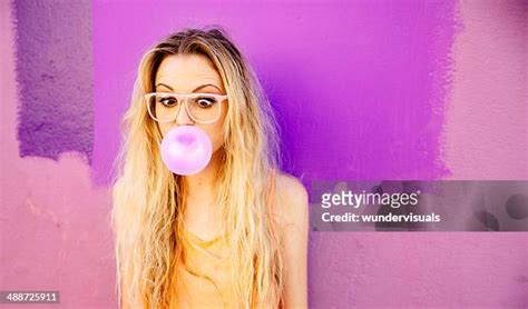 Teenage Girl Blowing Bubble Gum Photos And Premium High Res Pictures