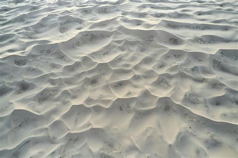Wavy Sandy Surface In Desert In Daylight · Free Stock Photo