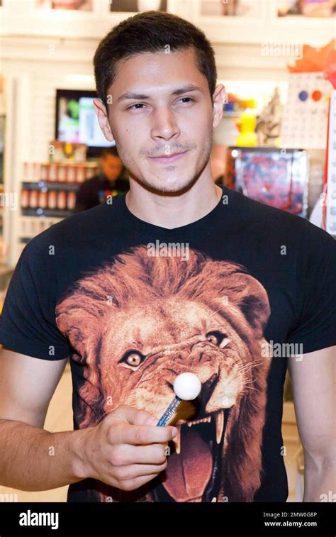Alex Meraz Of The Twilight Series Also Dubbed The Wolf Pack Pose With Lollipops For