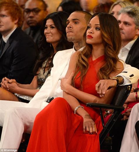 Yimitons Blog Rihanna Snuggles Chris Brown At The