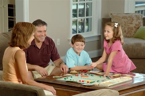 File:Family playing a board.jpg