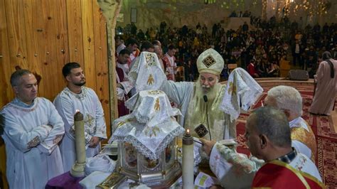 Coptic Christians Attend Christmas Eve Mass At Saint Saman Church In