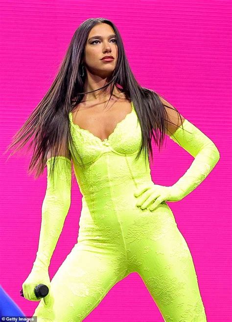 Dua Lipa Shows Off Her Incredible Figure In A Neon Yellow Catsuit Dua