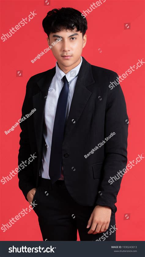 Asian Men Wearing Black Suit Holding Stock Photo 1930243013 Shutterstock