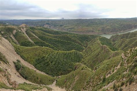 A river is a natural flowing watercourse, usually freshwater, flowing towards an ocean, sea, lake or another river. Laoniuwan. Yellow River makes a double bend. - 2016 - North of Shanxi province