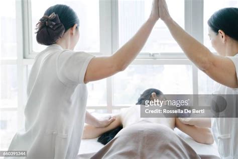 Four Hands Massage Photos And Premium High Res Pictures Getty Images