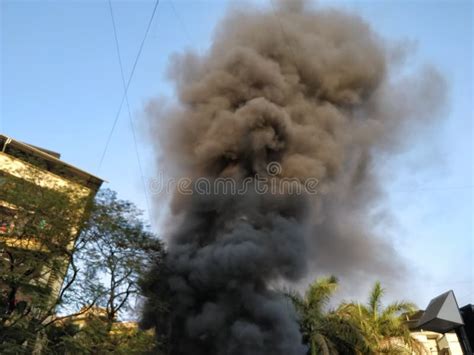 Black Smoke Coming Out Of A Building On Fire Stock Image Image Of