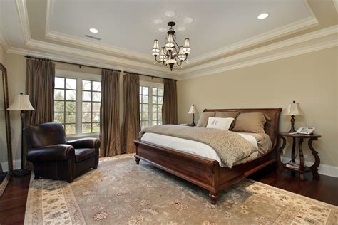 A tray ceiling can add style to a room, but the prep, framing, and finishing can be complicated and the job shown here is new construction, but the method would be no different in a remodeling. Master bedroom in luxury home with tray ceiling - Aura ...