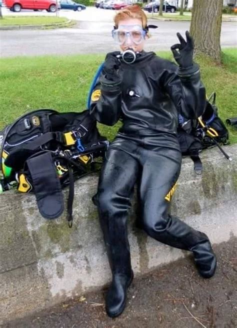 Beautiful Woman In Viking Rubber Drysuit With Rubber Gloves Viking