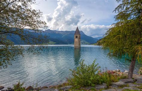 The Bell Tower Of The Sunken Church In Curon Resia Lake Bolzano