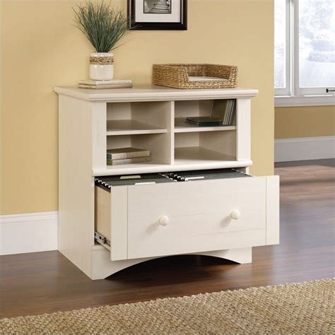A white file cabinet is ideal for a casual space, while a black filing cabinet works for a formal vibe. 1 Drawer Lateral Wood File Cabinet in Antique White - 158002
