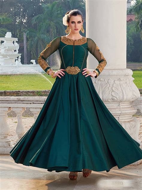 Party wear long gown cutting and stitching. Spectacular green fusion silk gown anarkali ensemble with ...