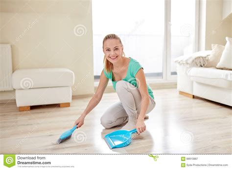 Happy Woman With Brush And Dustpan Sweeping Floor Stock Image Image