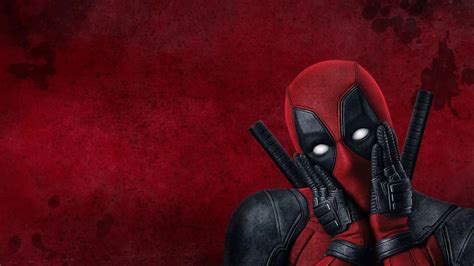 Deadpool With Weapons In Red Background Hd Deadpool Wallpapers Hd