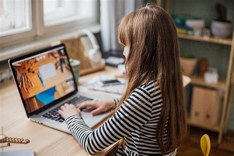 Girl Using A Laptop Computer By Stocksy Contributor Lumina Stocksy