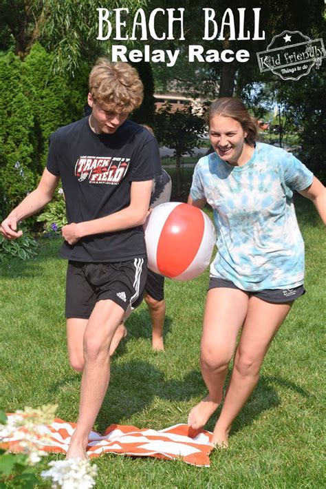 this beach ball relay race outdoor game is a blast to play perfect for large groups youth